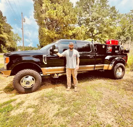 Breaux's Roadside owner-operator with service vehicle, ready for commercial truck tire service